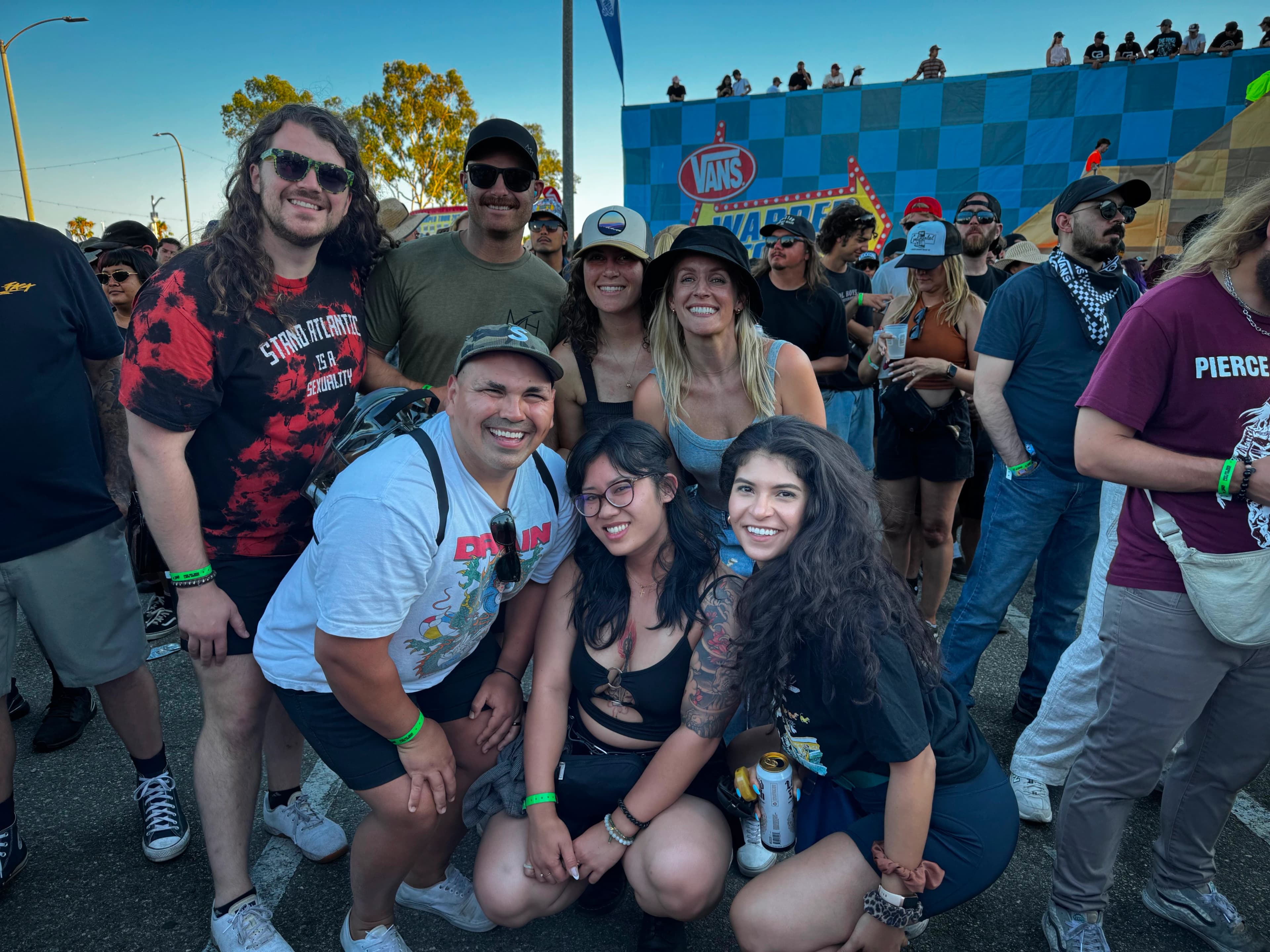 A group friends brave the Vans Warped Tour 2025.